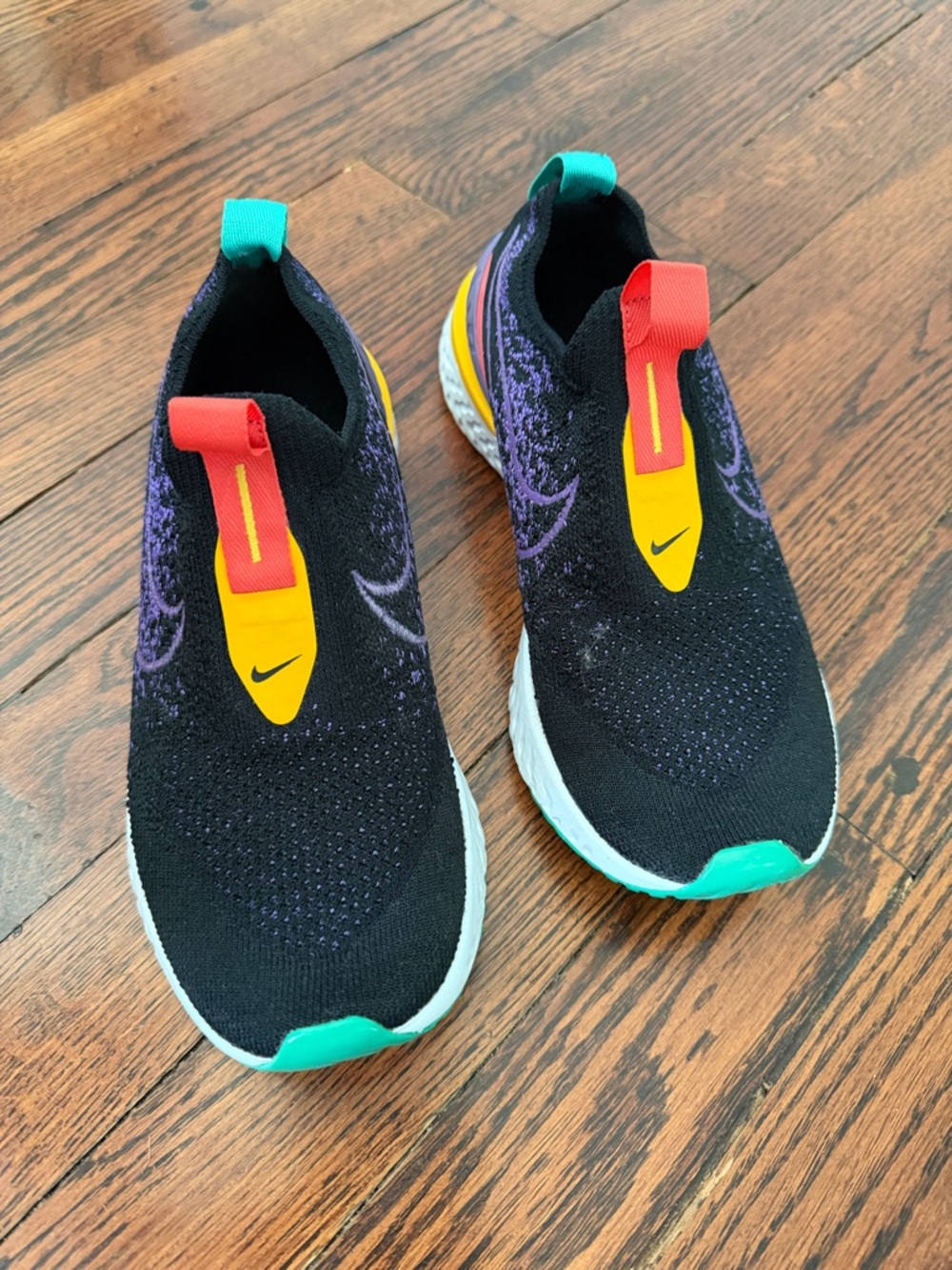 Nike Women's Black Athletic Slip-On Shoes with Purple, Teal & Yellow Accents